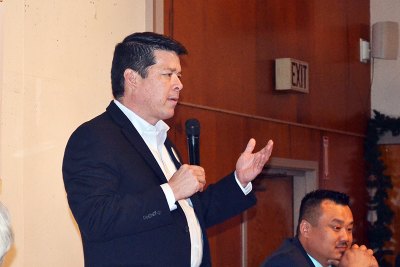 T.J. Cox, who is running against District 21 Rep. David Valadao, makes a point during a "Seniors Vote" forum Tuesday at the Hanford Fraternal Hall.